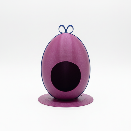 Purple egg-shaped hangable house on white background
